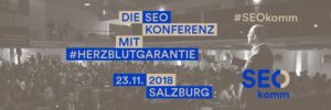 Banner der SEOkomm 2018 inklusive Slogan Herzblutgarantie